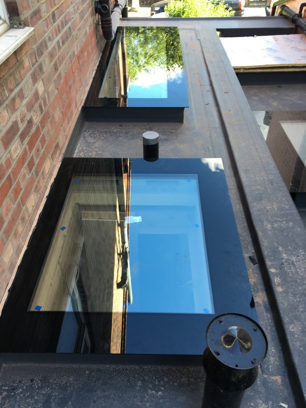 Multiple flat roof skylights on extension in Sydenham